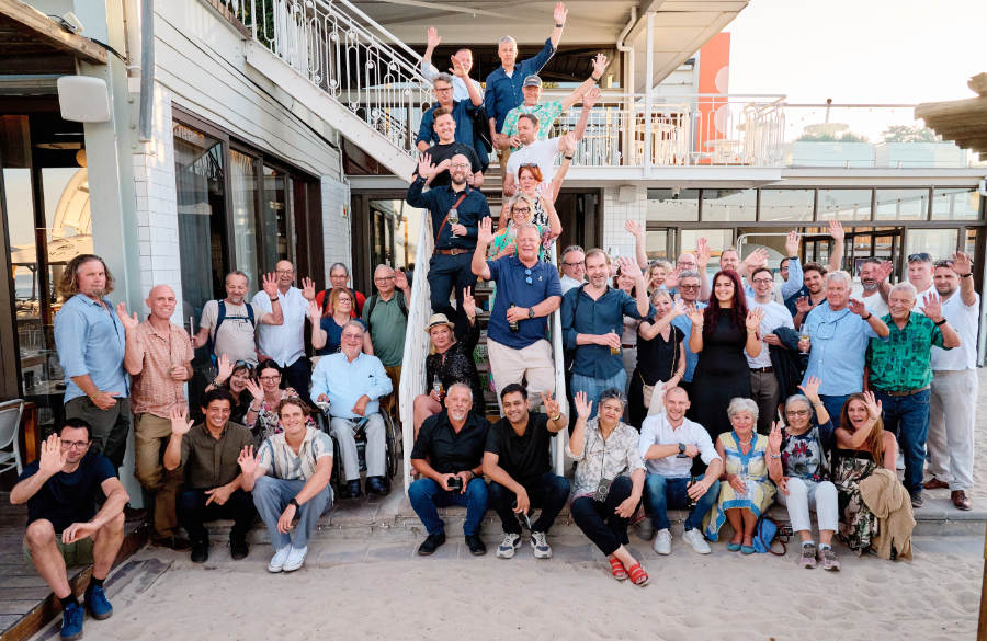 The Kuratel family, friends, speakers and conference sponsors enjoy a pre-conference get together.